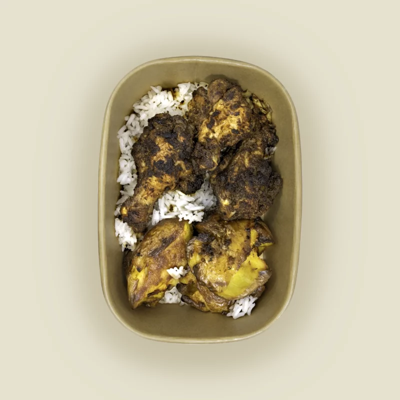 FatboySexy mealprep met kruidige jerk chicken, rijst en gebakken aardappelen – high-protein en vers bereid.